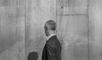 men-looking-at-a-wall