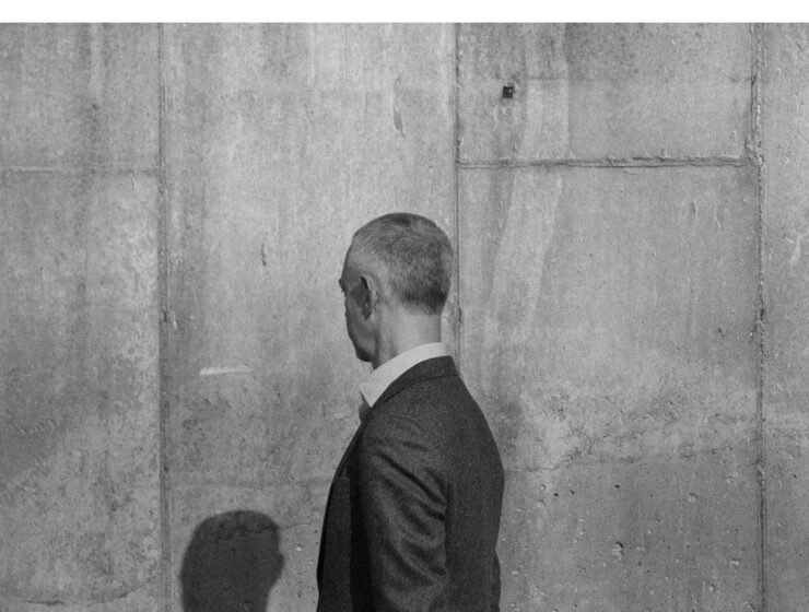 men-looking-at-a-wall
